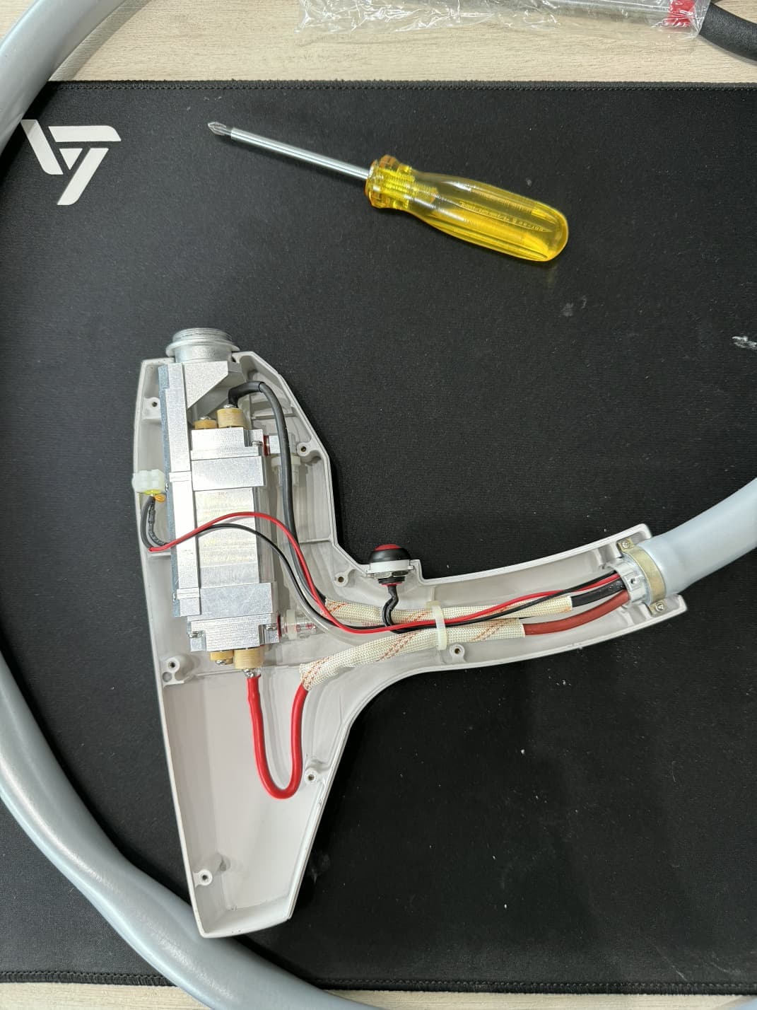 Er:YAG 2940nm resonator assembly teardown – SGT Industries precision laser repair